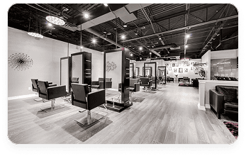 Salon owner looking at a phone